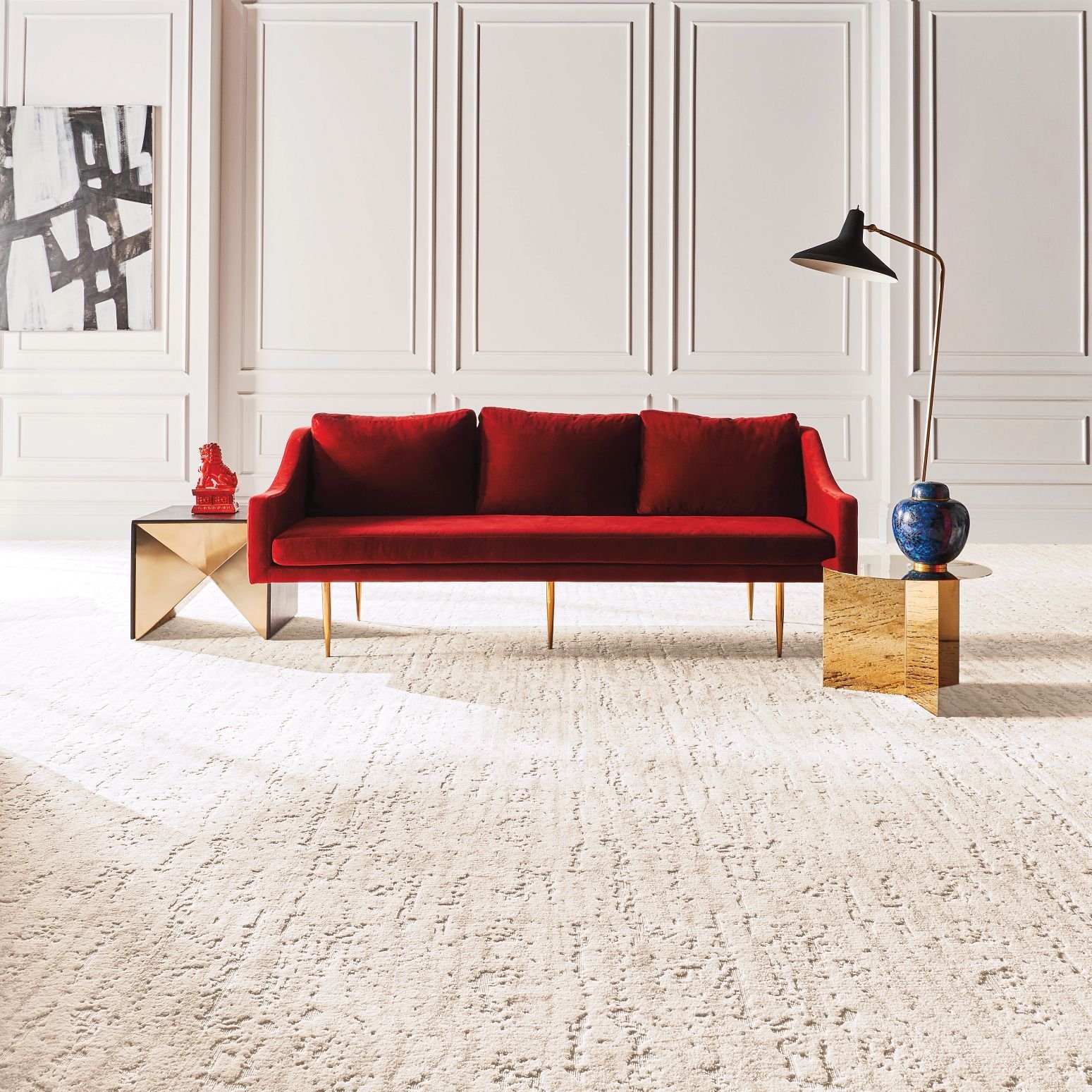 Red couch on carpet from Carpet World Flooring in Canyon